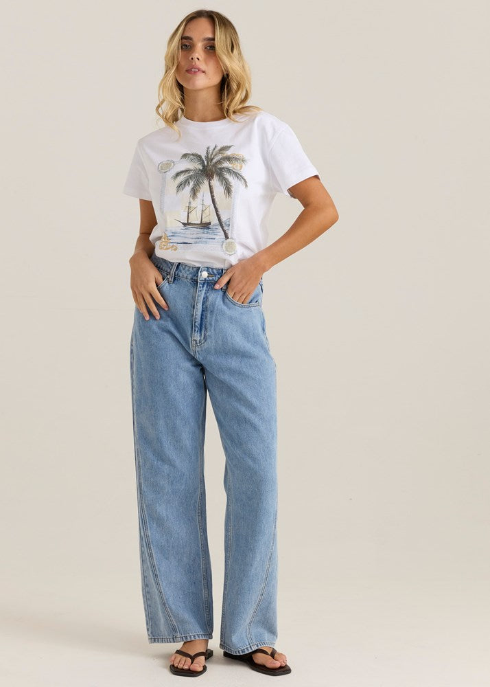 Image of a model wearing Pants. Product name - Nuala Wide Leg Jean 90'S Blue Wash in 90'S Blue Wash colour by brand - Sass Clothing