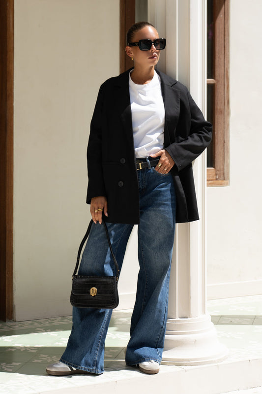 Image of a model wearing Shorts. Productname: Heychic Dylan Blue Denim Wide Leg Jeans in Blue colour by brand - Heychic