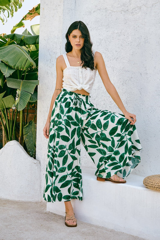 Image of a model wearing Pants. Productname: Heychic Ivy Tropical Wide Leg Cropped Pants in Green colour by brand - Heychic