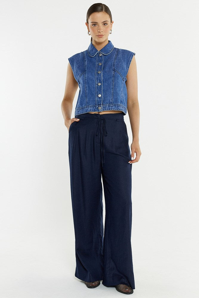 Image of a model wearing Pants. Product name - Beth Tailored Pant in Navy colour by brand - Sass Clothing