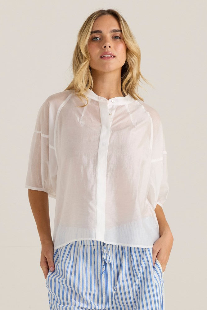 Image of a model wearing Tops. Product name - Wilder Seam Blouse White in White colour by brand - Sass Clothing