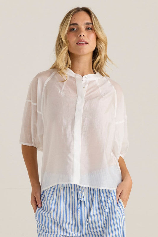 Image of a model wearing Tops. Product name - Wilder Seam Blouse White in White colour by brand - Sass Clothing