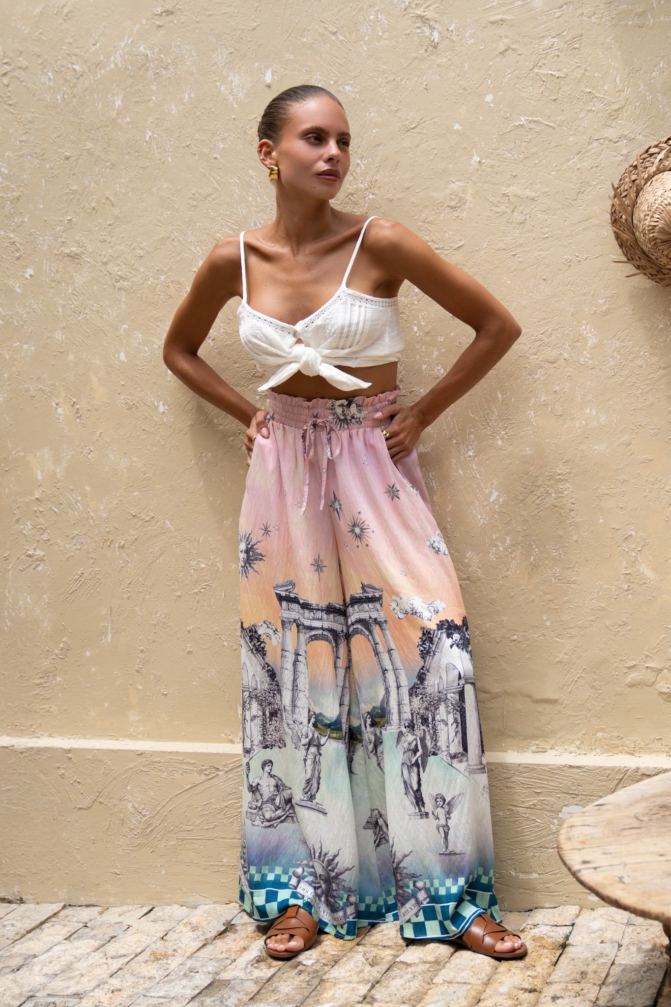 Image of a model wearing Shorts. Productname: Heychic Valora Pink Abstract Wide Leg Pants in Pink colour by brand - Heychic