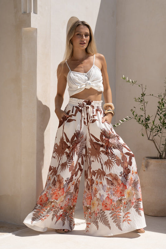 Image of a model wearing Shorts. Productname: HEYCHIC Kailah Brown Tropical Wide Leg Pants in Brown colour by brand - HEYCHIC