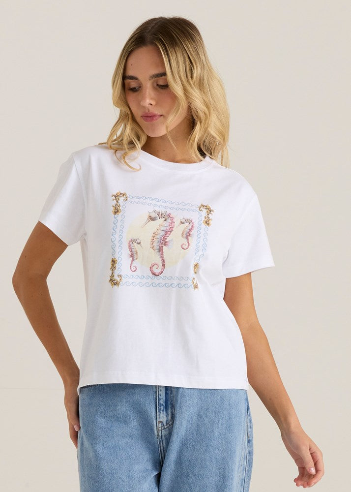 Image of a model wearing Tops. Product name - Ray Tee Seahorse in Seahorse colour by brand - Sass Clothing