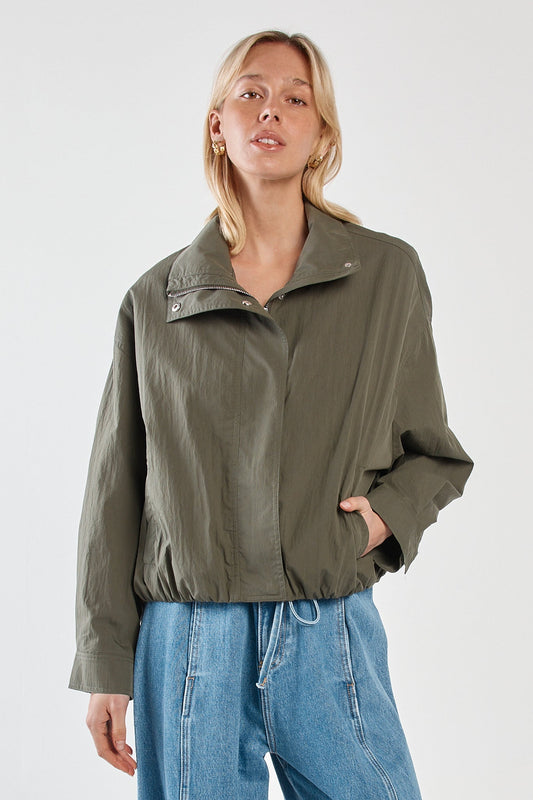 Image of a model wearing Outerwear. Product name - Murphy Bomber Jacket Olive in Olive colour by brand - Sass Clothing