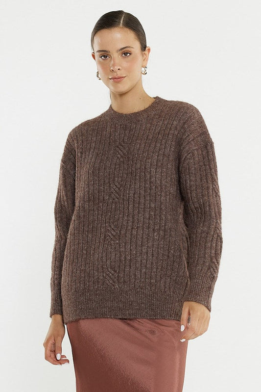 Image of a model wearing Outerwear. Product name - Kira Cable Jumper in Dusty Rose colour by brand - Sass Clothing