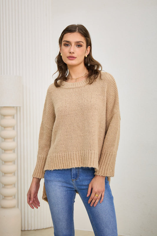 Image of a model wearing Tops. Productname: Heychic Nora Step Hem Knit Sweater in Beige colour by brand - Heychic