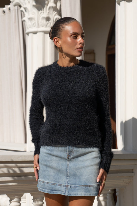 Image of a model wearing Tops. Productname: Heychic Jase Fluffy Knit Sweater in Black colour by brand - Heychic