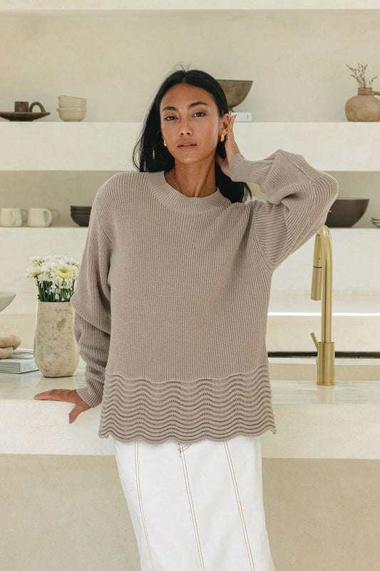 Image of a model wearing Tops. Productname: Heychic Claudia Scallop Hem Knit Sweater in Beige colour by brand - Heychic