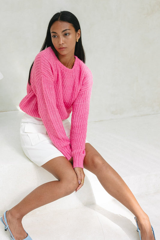 Image of a model wearing Tops. Productname: Heychic Jenni Knit Sweater in Pink colour by brand - Heychic