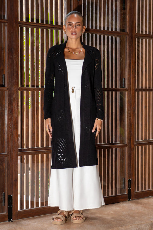 Image of a model wearing Tops. Productname: Heychic Elaine Longline Crochet Knit Cardigan in Black colour by brand - Heychic