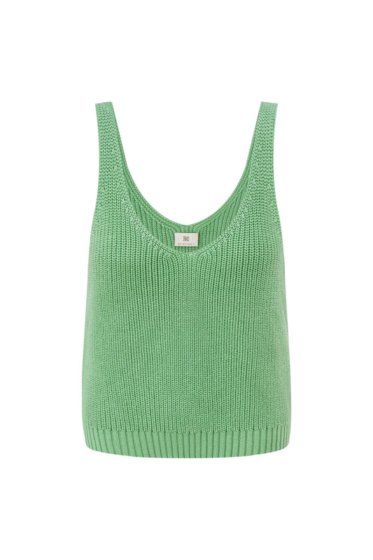 Image of a model wearing Tops. Product name - Nico Green Knit Top in Green colour by brand - HEYCHIC