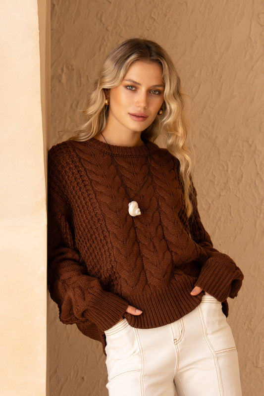 Image of a model wearing Tops. Product name - Alia Brown Cable Knit Sweater in Brown colour by brand - HEYCHIC