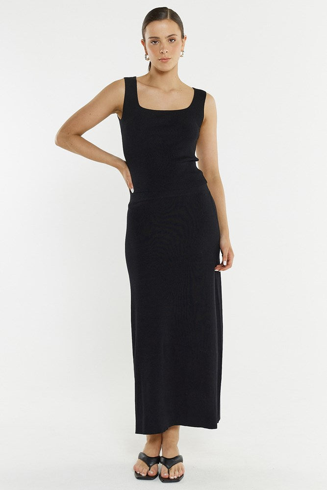 Image of a model wearing Skirts. Product name - Hazel Rib Skirt in Black colour by brand - Sass Clothing