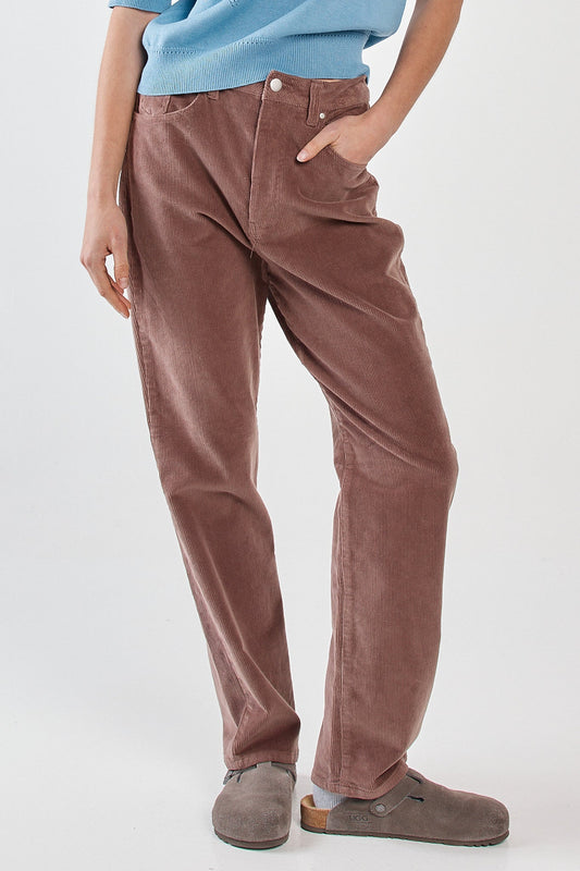 Image of a model wearing Pants. Product name - Parco Cord Straight Jean Mushroom in Mushroom colour by brand - Sass Clothing