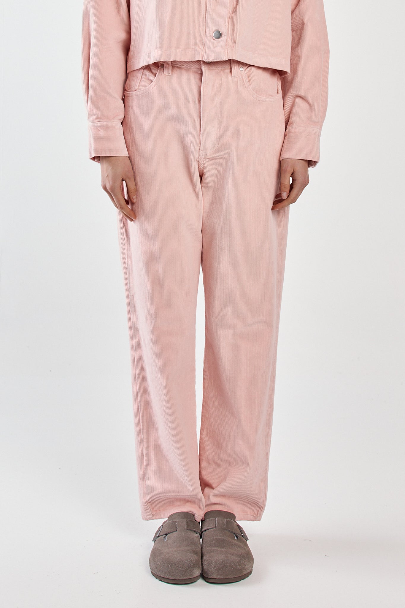 Image of a model wearing Pants. Product name - Parco Cord Straight Jean Dusty Pink in Dusty Pink colour by brand - Sass Clothing