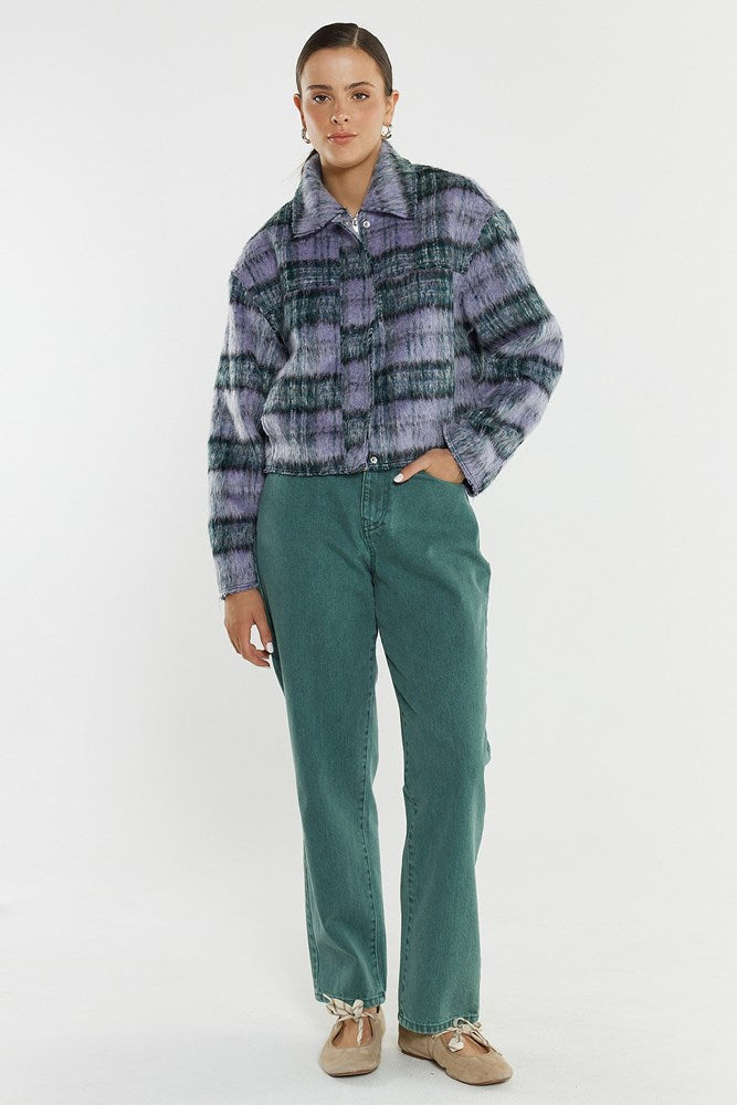Image of a model wearing Pants. Product name - Shylah Slim Straight Jean in Green Wash colour by brand - Sass Clothing