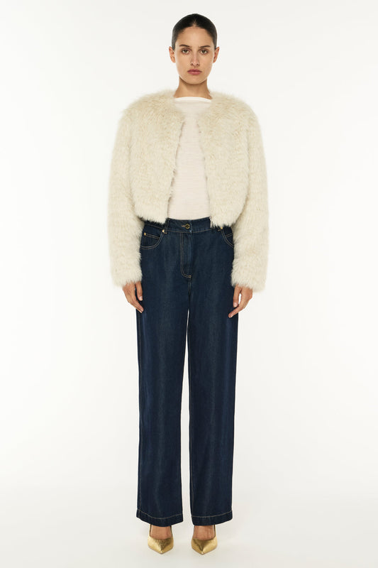 Image of a model wearing Denim. Productname: Off The Wall Jean in DARK INDIGO colour by brand - Manning Cartell