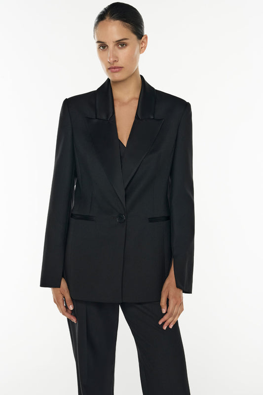 Image of a model wearing Outerwear. Productname: Major Suit Blazer in BLACK colour by brand - Manning Cartell