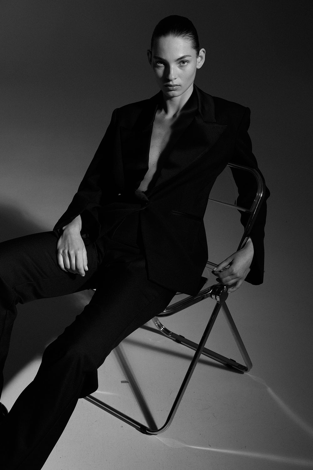 Image of a model wearing Outerwear. Productname: Major Suit Blazer in Black colour by brand - Manning Cartell