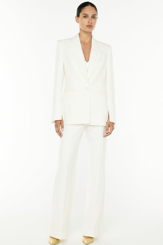 Image of a model wearing Outerwear. Productname: Major Suit Blazer in IVORY colour by brand - Manning Cartell