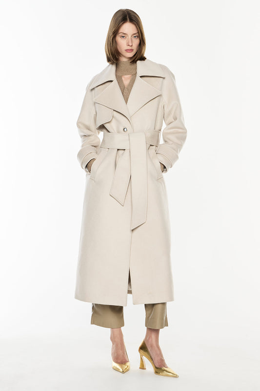 Image of a model wearing Outerwear. Productname: Parisian Lens Coat in Stone colour by brand - Manning Cartell