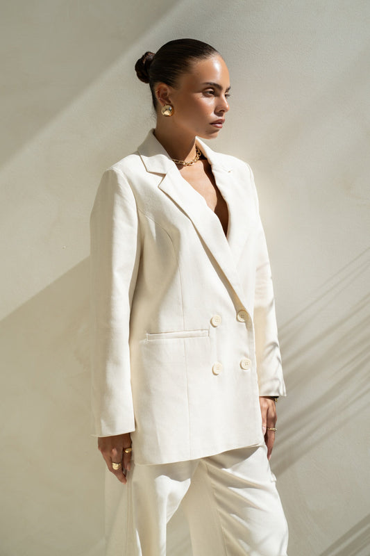 Image of a model wearing Tops. Productname: Heychic Keke Beige Double Breasted Blazer in Beige colour by brand - Heychic