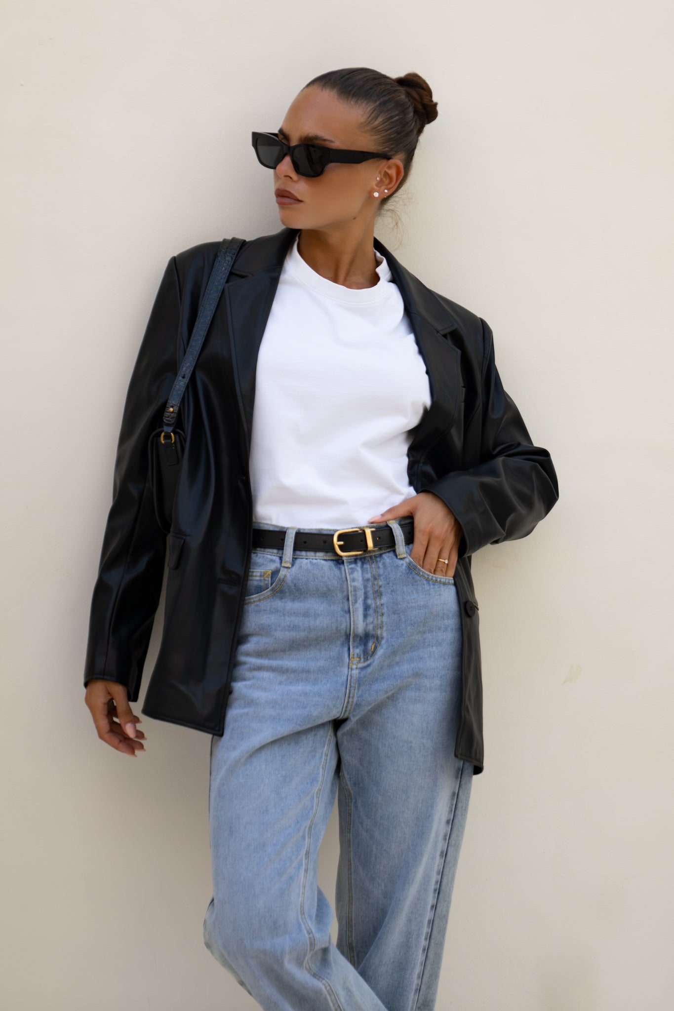 Image of a model wearing Tops. Productname: Heychic Ellison Faux Leather Jacket in Black colour by brand - Heychic