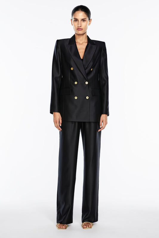 Image of a model wearing Outerwear. Productname: Neutral Stance Blazer in Black colour by brand - Manning Cartell