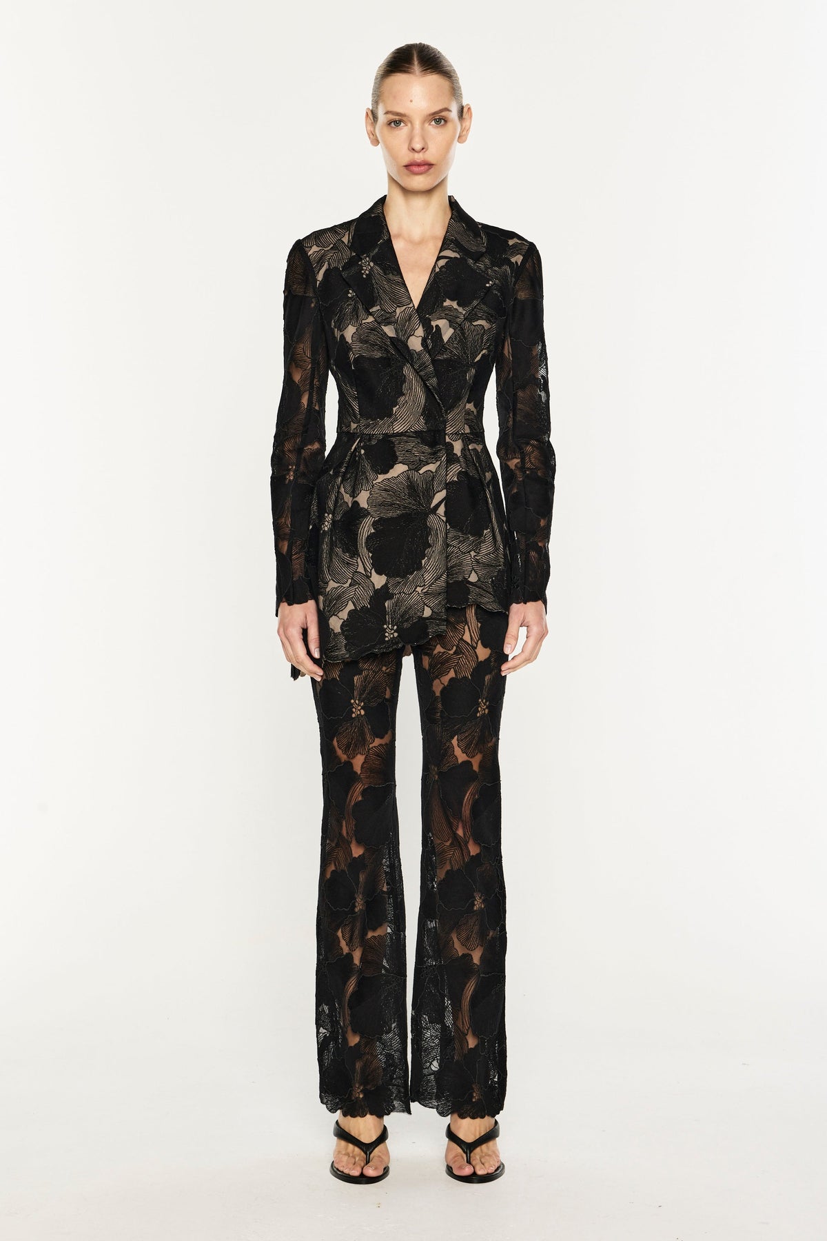 Image of Jackets. Product name - Sheer Force Peplum Blazer in Black colour by brand - MANNING CARTELL