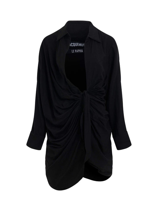 Image of a model wearing Dress. Productname: JACQUEMUS Bahia Sash Dress in Black colour by brand - JACQUEMUS