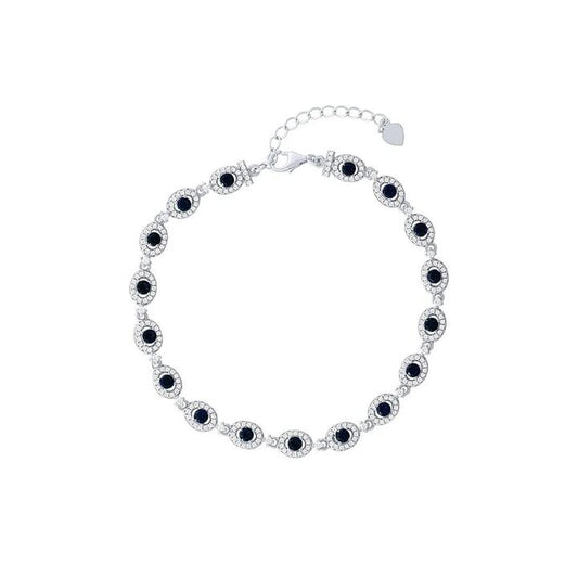 Image of Bracelets. Product name - 21.5cm 3mm Width Halo Bracelet with Blue Cubic Zirconias in Sterling Silver in colour by brand - Bevilles