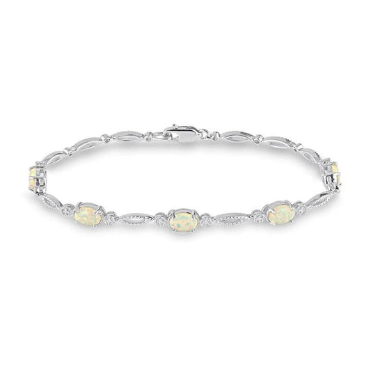 Image of Bracelets. Productname: Mirage Diamond Set Created Opal Bracelet in Sterling Silver in Diamond colour by brand - Bevilles