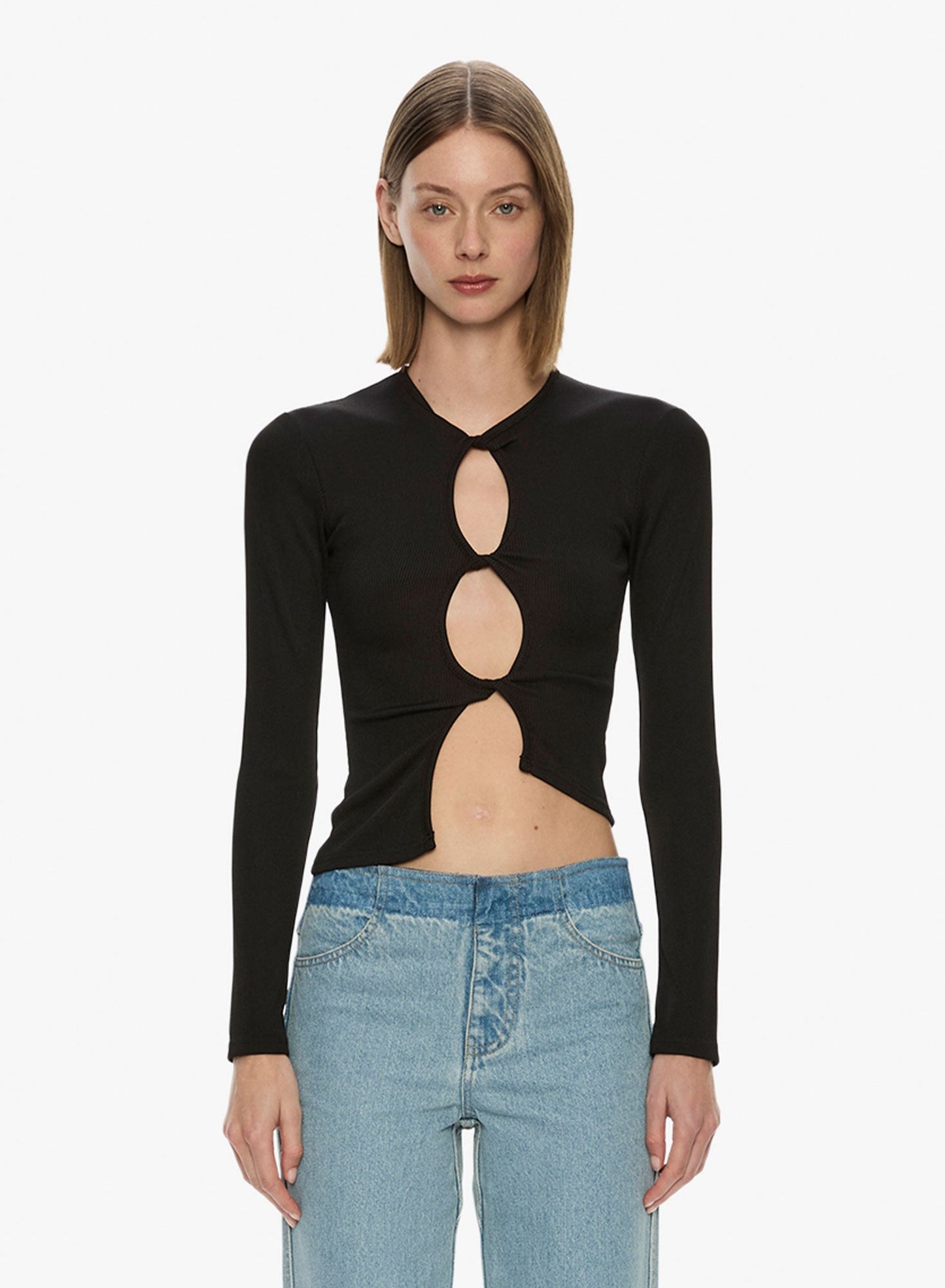 Image of a model wearing Tops. Productname: Christopher Esber Open Twist Long Sleeve Top in Black colour by brand - Christopher Esber