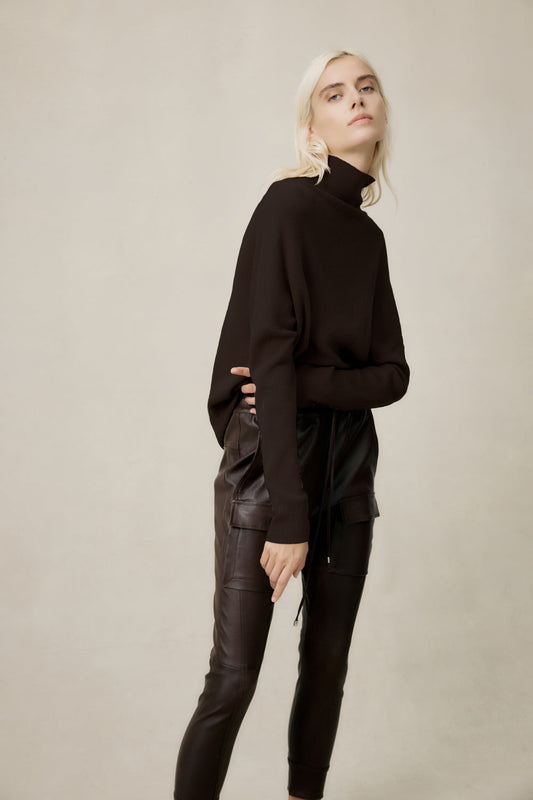 Image of a model wearing Pants. Productname: Open Season Stretch Leather Pant in Espresso colour by brand - Manning Cartell