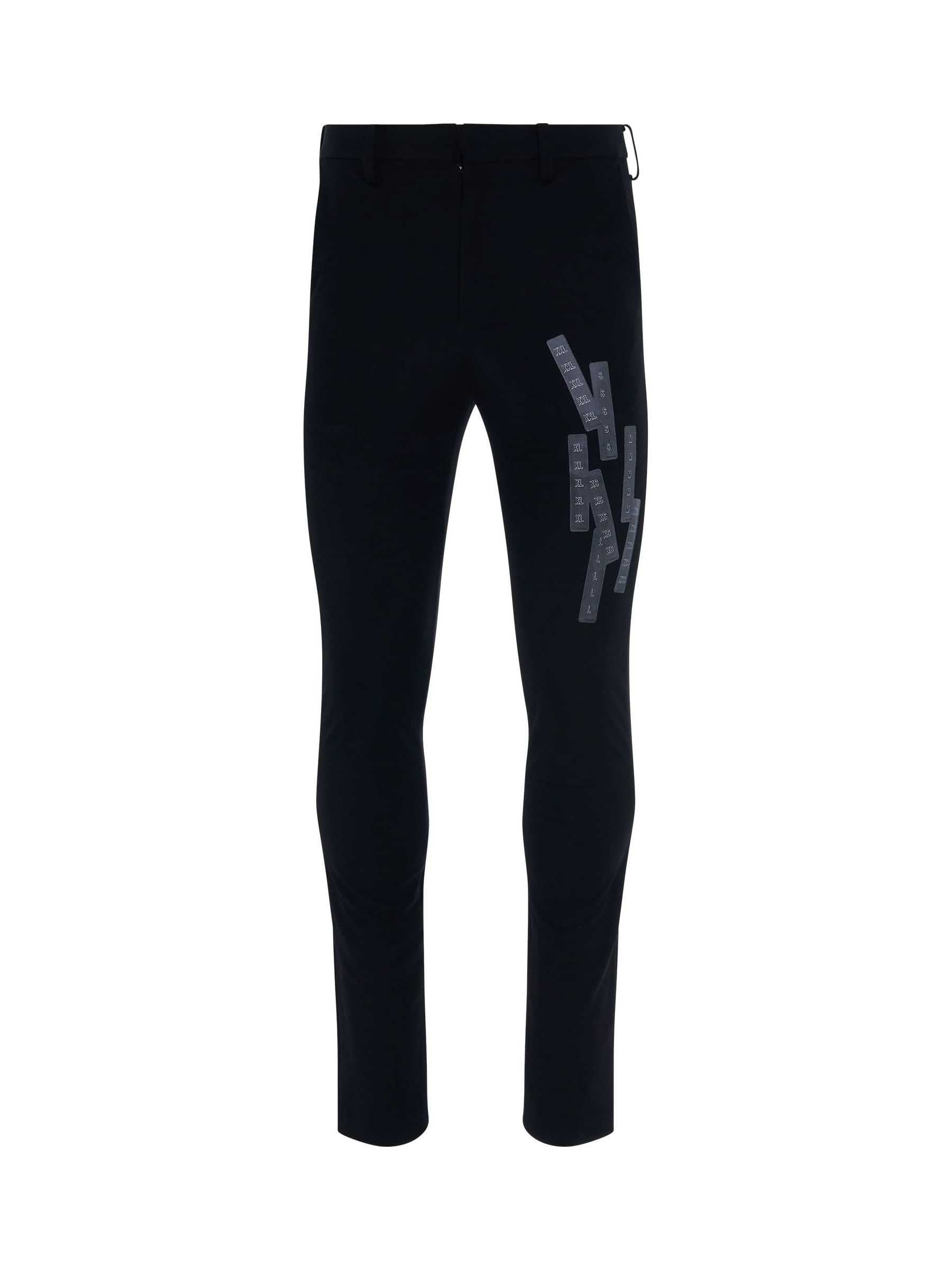 Image of a model wearing Pants. Productname: DOUBLET Stretching Tape Trousers in BLACK colour by brand - DOUBLET