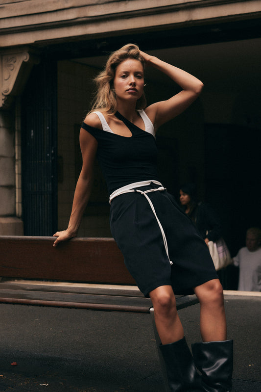 Image of a model wearing Tops. Productname: SNDYS ADANA TANK TOP in Black colour by brand - SNDYS