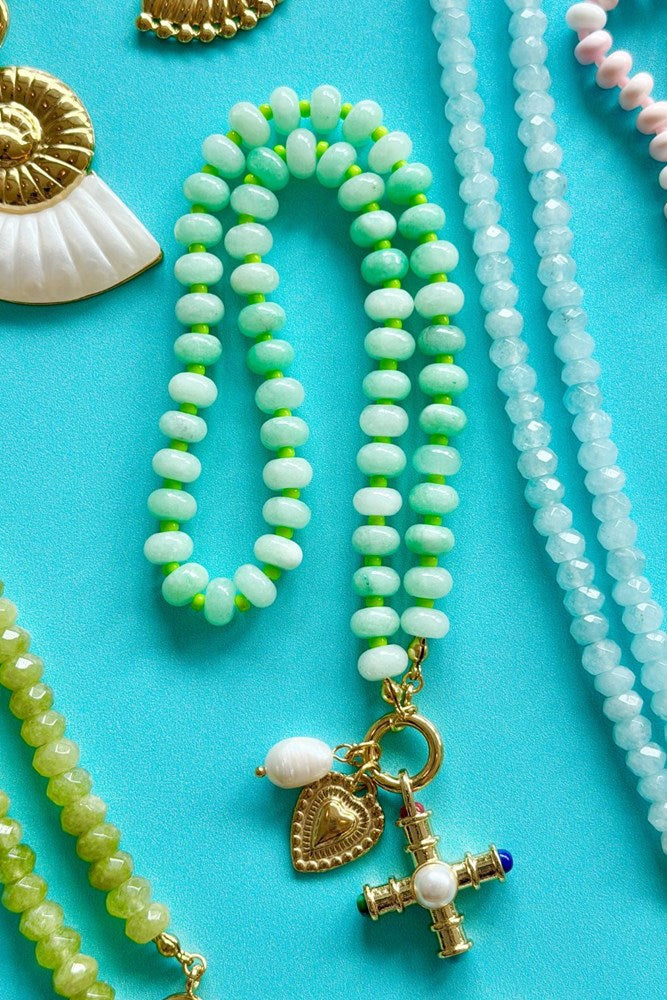 Image of Necklaces. Product name - Golden Saint Necklace in Green colour by brand - Betty Basics