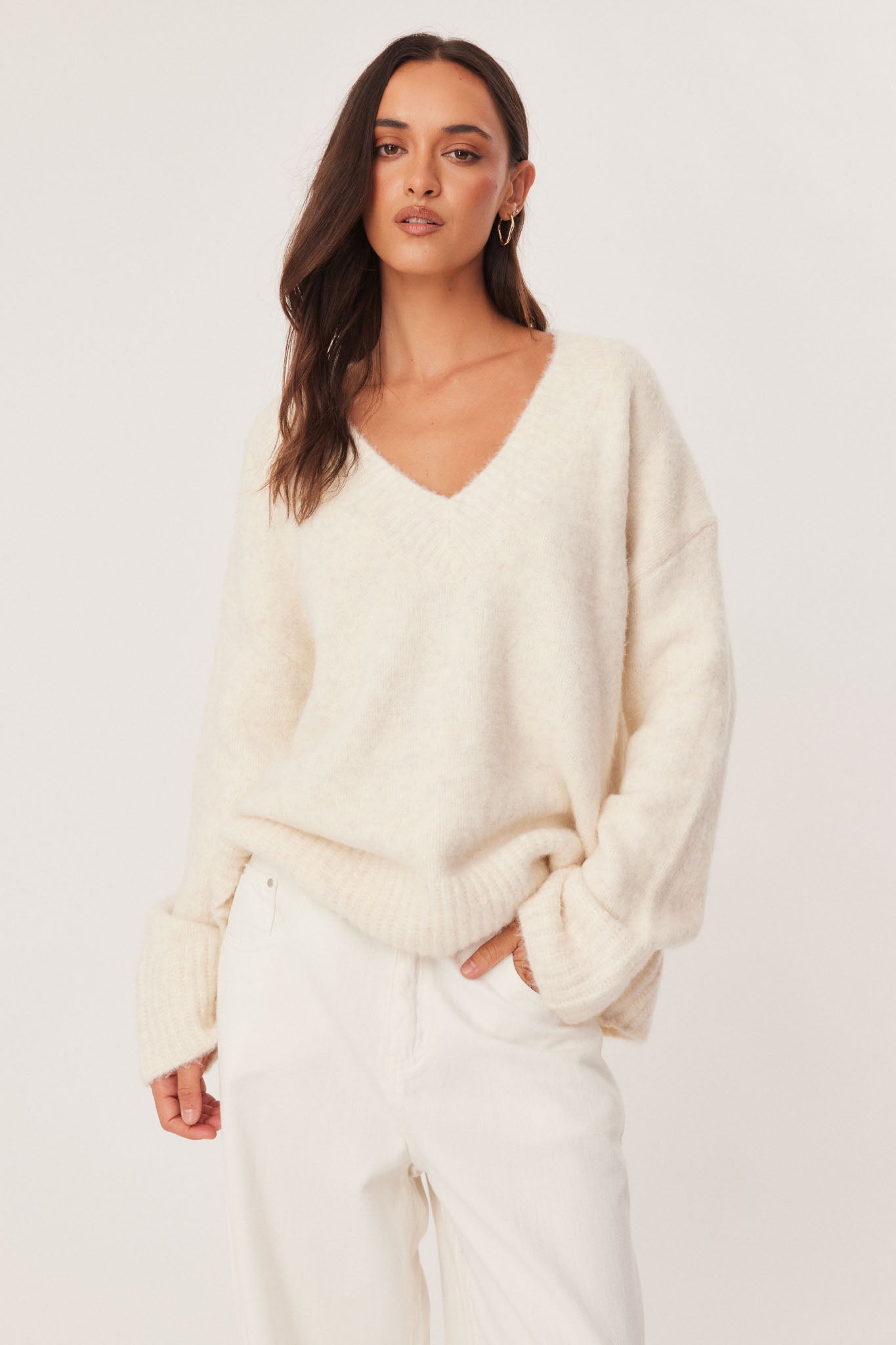 Image of a model wearing Outerwear. Productname: SNDYS ODELIA KNIT JUMPER in Cream colour by brand - SNDYS