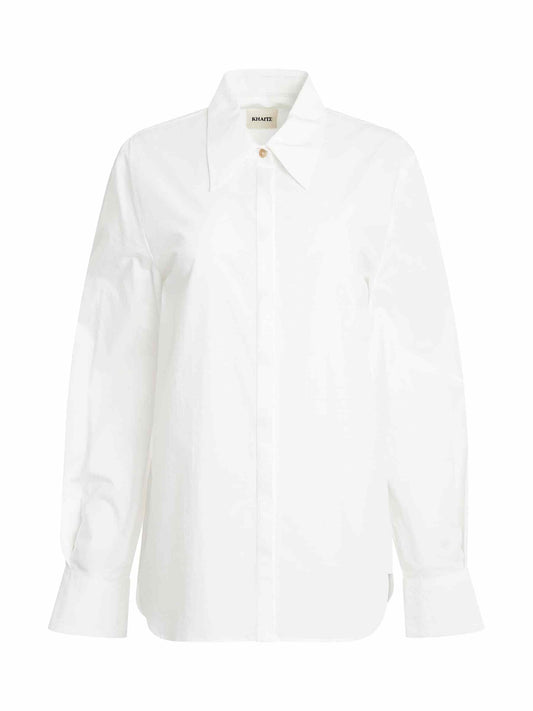 Image of a model wearing Tops. Productname: KHAITE Minta Shirt in WHITE colour by brand - KHAITE