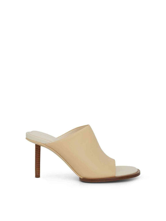 Image of Sandals. Productname: JACQUEMUS Carre Geometric Mules in Off White colour by brand - JACQUEMUS