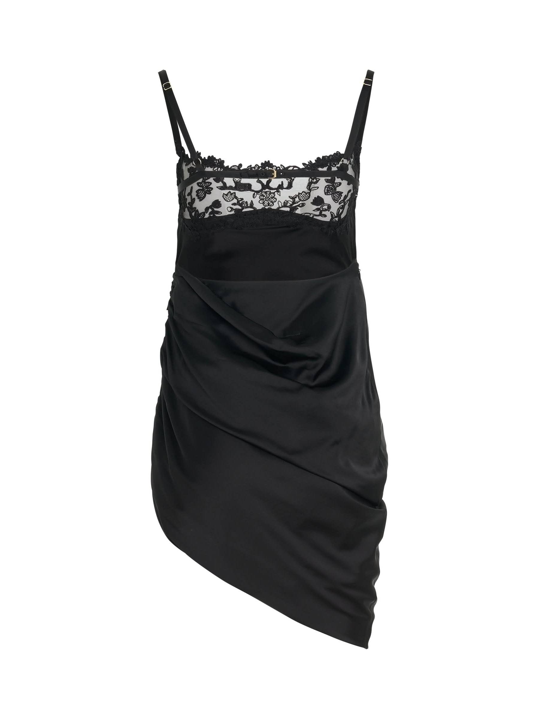 Image of a model wearing Dress. Productname: JACQUEMUS Brodee Lingerine Dress in Black colour by brand - JACQUEMUS