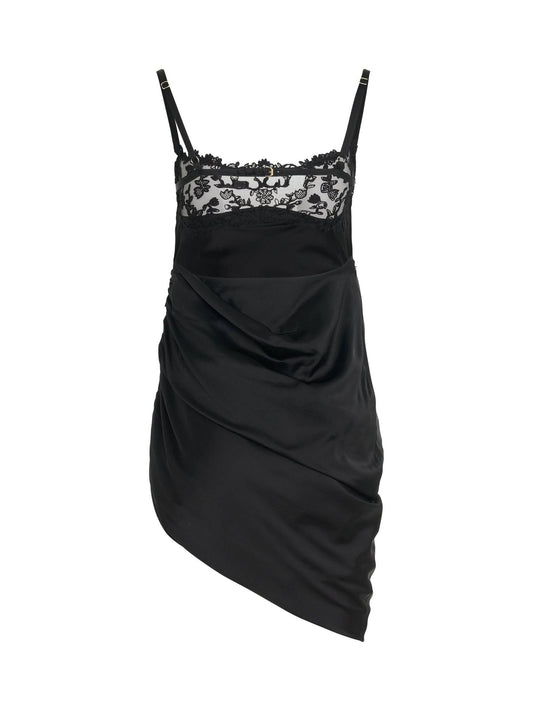 Image of a model wearing Dress. Productname: JACQUEMUS Brodee Lingerine Dress in Black colour by brand - JACQUEMUS