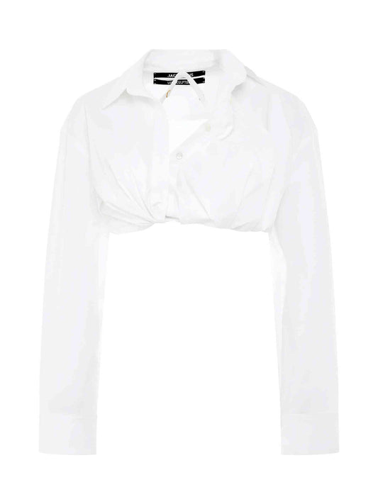 Image of a model wearing Tops. Productname: JACQUEMUS Bahia Courte Shirt in WHITE colour by brand - JACQUEMUS