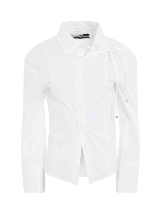 Image of a model wearing Tops. Productname: JACQUEMUS Ruban Ribbon Shirt in White colour by brand - JACQUEMUS