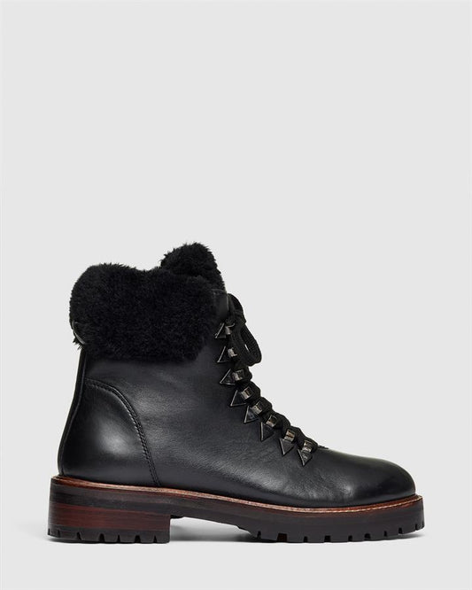 Image of Boots. Product name - Triumph Women's Boot Flat Black Smooth Novo Boots in Black Smooth colour by brand - NOVO