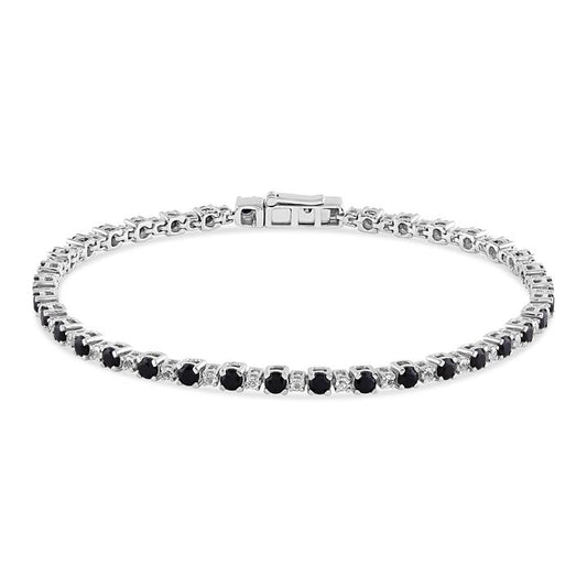 Image of Bracelets. Productname: Diamond Set Black and White Created Sapphire Tennis Bracelet in Sterling Silver in Diamond colour by brand - Bevilles