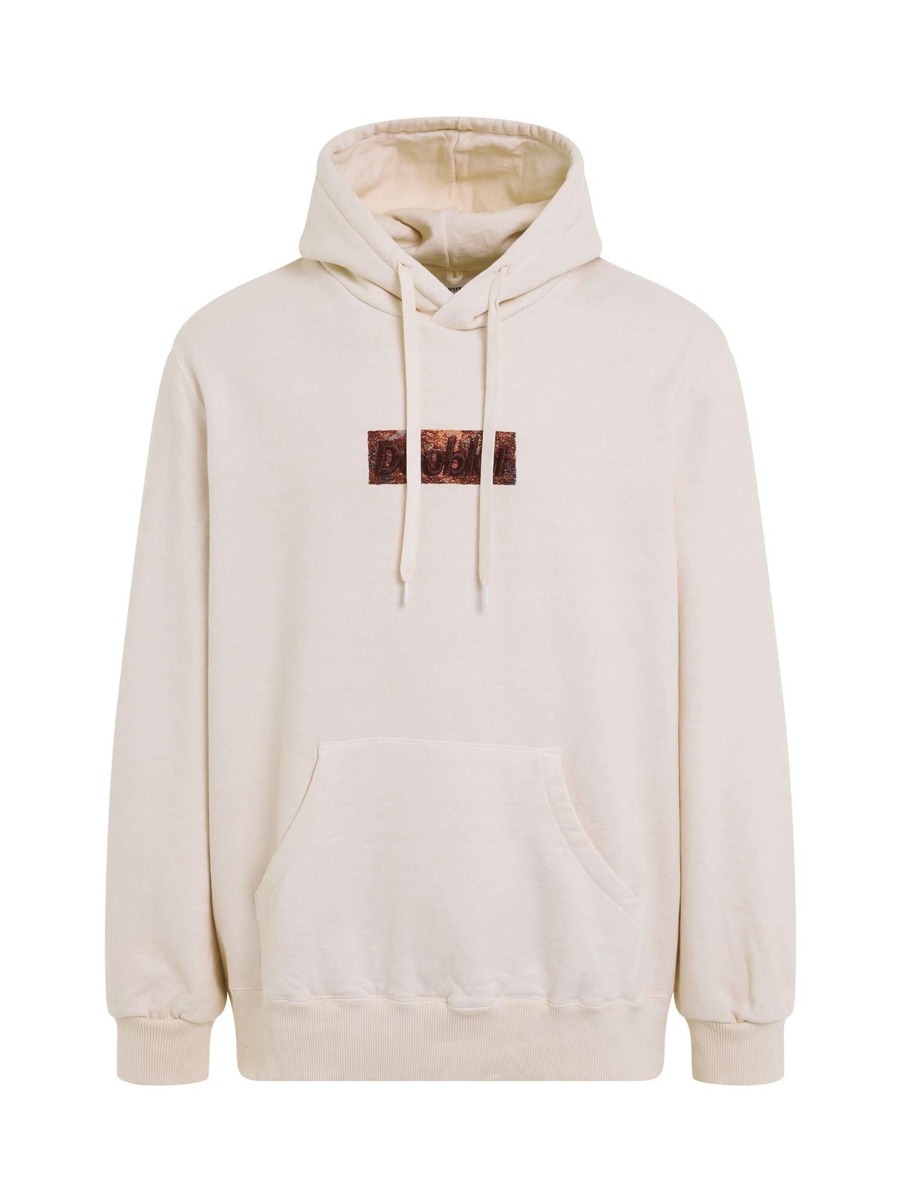 Image of a model wearing Outerwear. Productname: DOUBLET Rust Embroidery Hoodie in WHITE colour by brand - DOUBLET