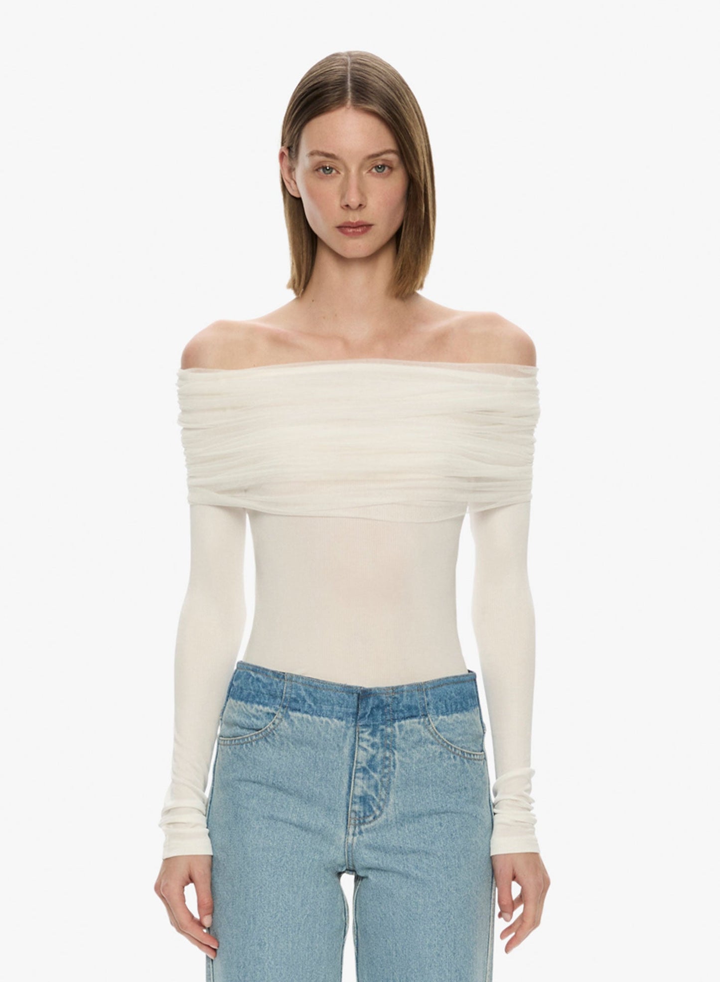 Image of a model wearing Tops. Productname: Christopher Esber Sonora Veiled Long Sleeve Top in White colour by brand - Christopher Esber